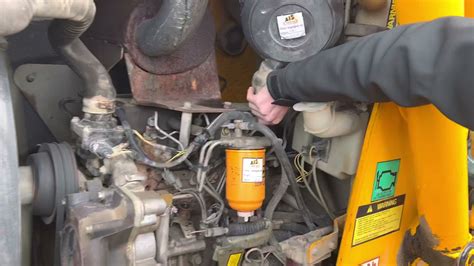 to switch between SAE (backhoe) and ISO (excavator) patterns. . Jcb backhoe control switch